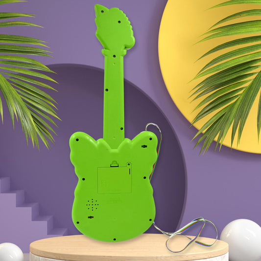 Toddler pressing keys on the butterfly shaped musical guitar toy.