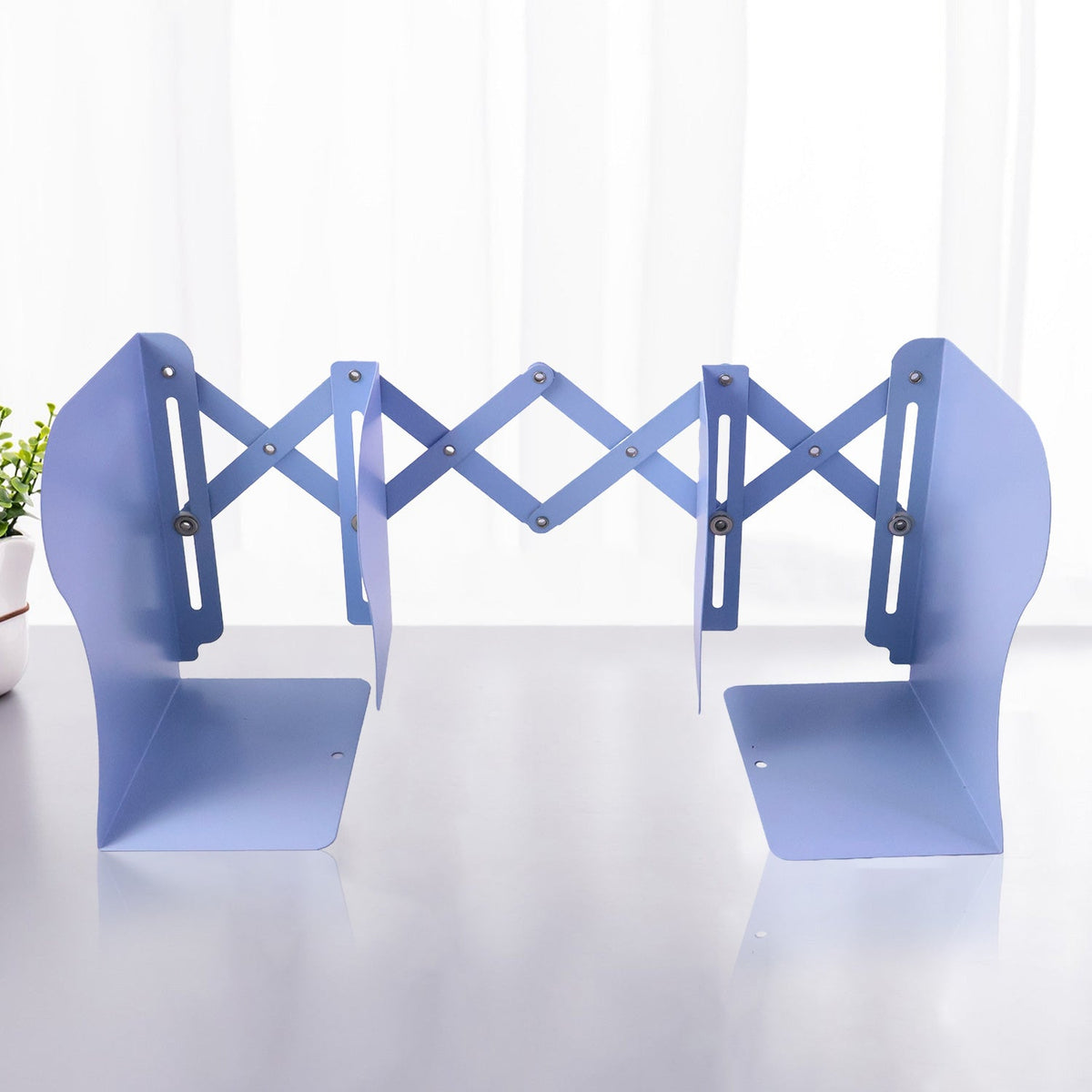 Foldable book stand in compact form for saving desk space