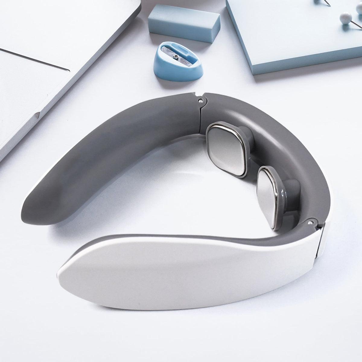 A user wearing the portable Electric Neck Massager, showing comfortable cervical vertebra massage.